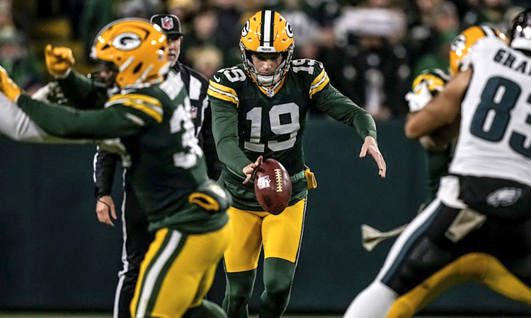 Nuestro "Choppunter" en uno de sus partidos más atareados - packers.com